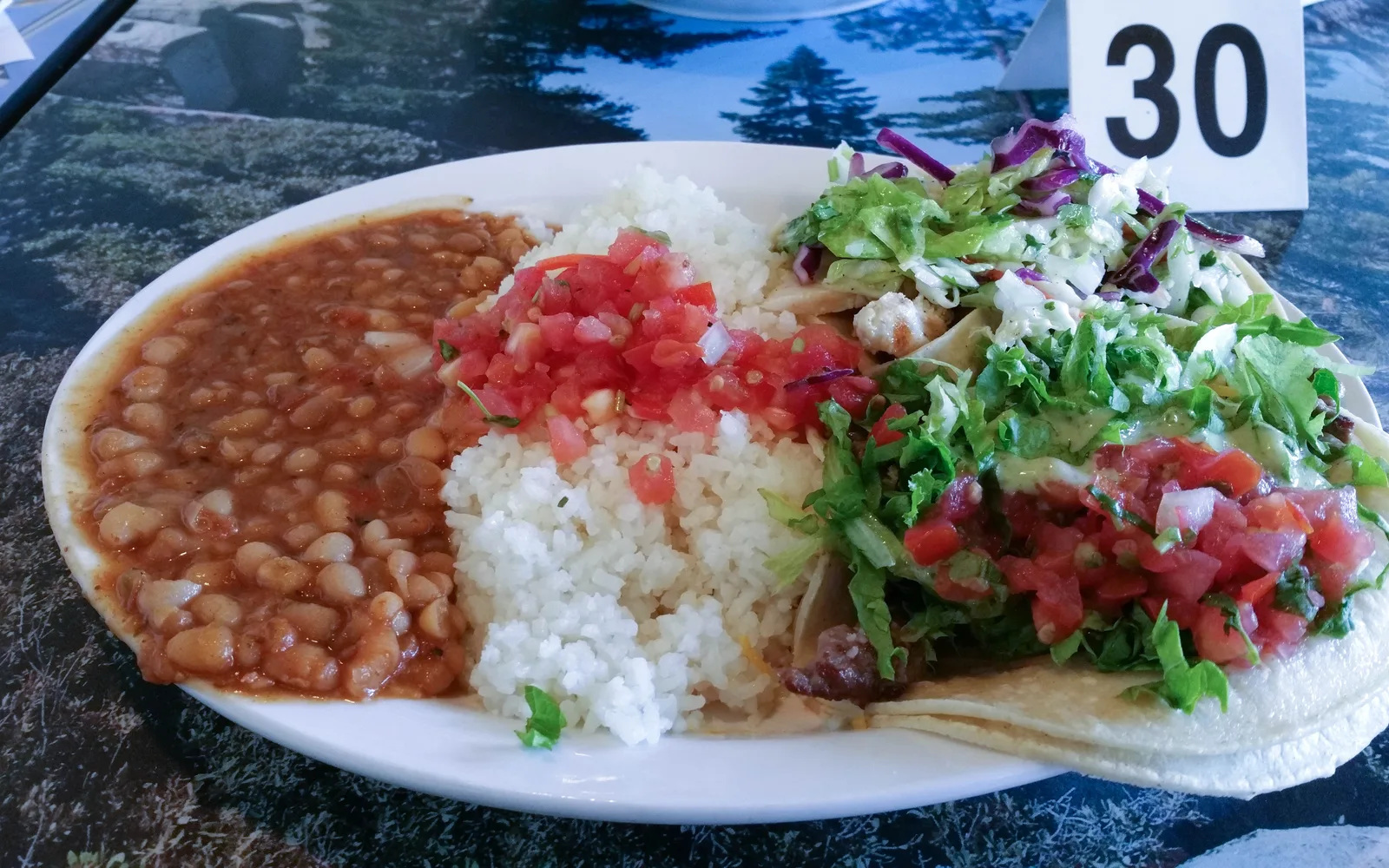 Fish tacos with fresh toppings and vibrant colors, representing California's diverse international and multicultural cuisine